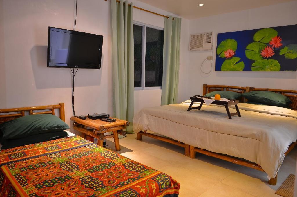 Punta Bulata White Beach Resort & Spa Cauayan  Rom bilde